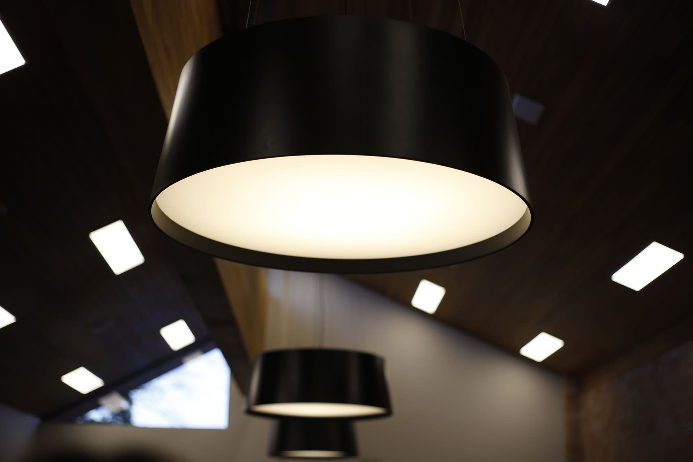 Pendant lights and LED downlights in a modern interior