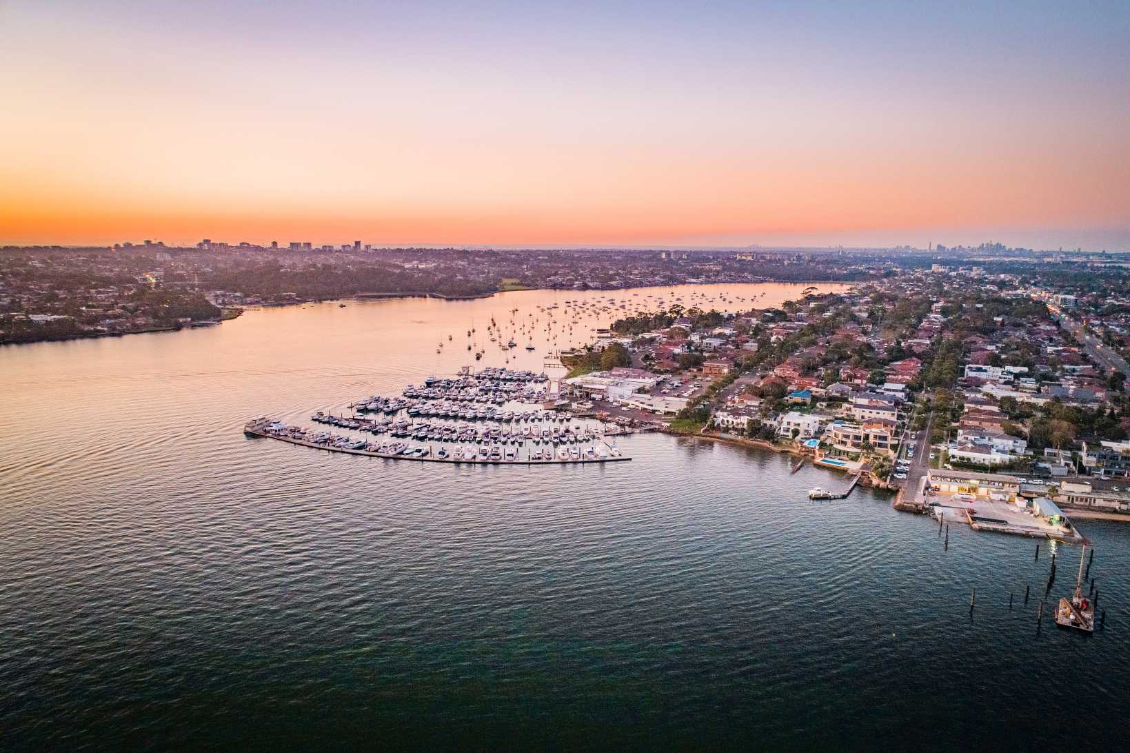 Aerial view of Sydney's southern suburbs and bay at dusk