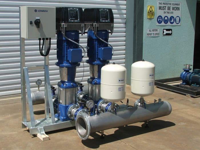 A pressure booster set with two pumps, pressure vessels and a control panel